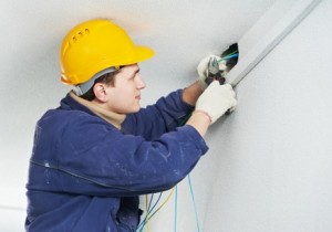 electrical installation engineer installing wiring system